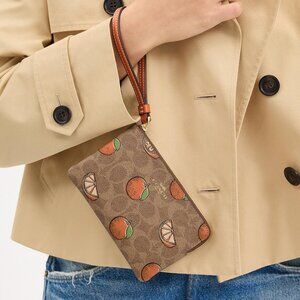 Corner Zip Wristlet In Signature Canvas With Orange Print New